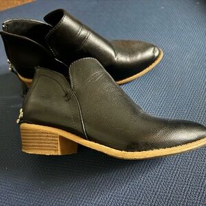 Black leather Chelsea boots with back zip.